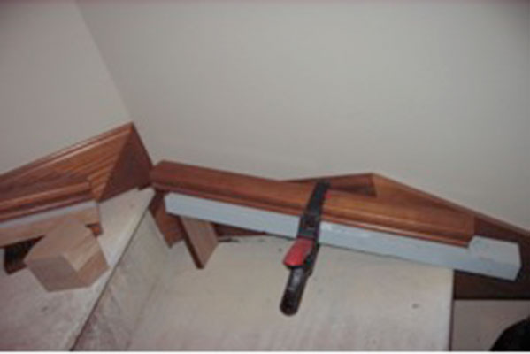 clamp section of stair rail